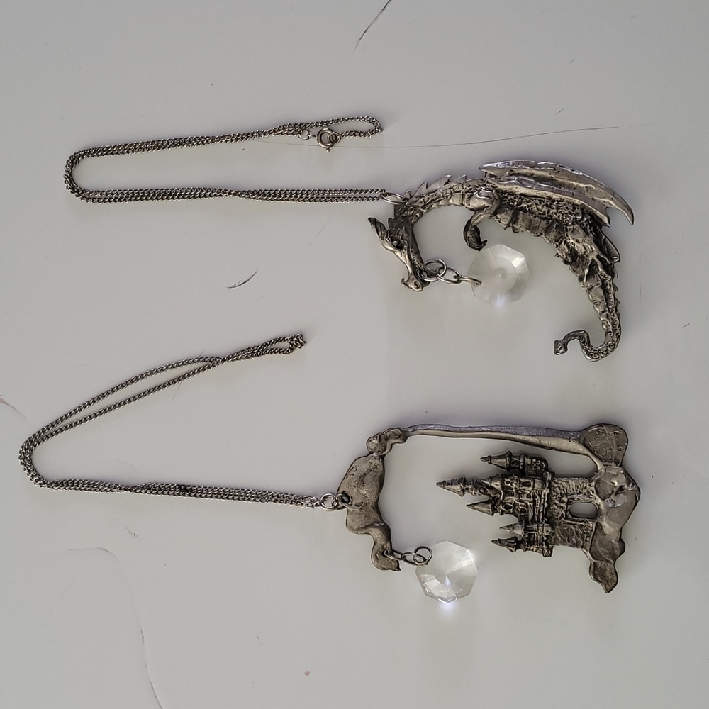 Dragon and castle pendants